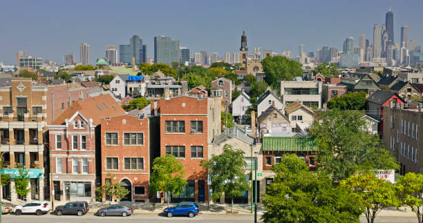 Aerial shot of Chicago, Illinois on a clear day in Fall from over West Town. Cheap places to live in Chicago skyline view 2025