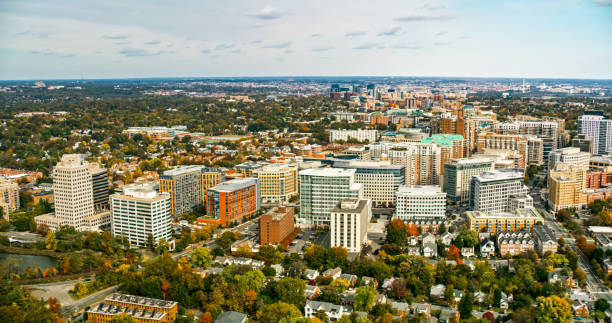 Helicopter shot of Arlington, Virginia on a hazy afternoon in Fall. How much is a condo in Arlington VA